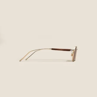 Gafas de sol rectangulares con montura metálica dorada