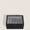 Gran caja de coleccionista en madera y laca para 24 instrumentos de escritura